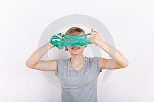 Funny girl holding  a slime