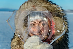 Funny girl with an icicle.