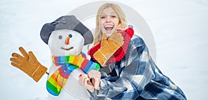 Funny Girl Love winter. Outdoor portrait of young pretty beautiful woman in cold sunny winter weather in park. Winter