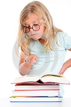 Funny girl with pile of books and round glasses