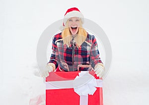 Funny girl push big gift box full length concept. Promotion and bonuses. Funny woman holding a big Christmas present