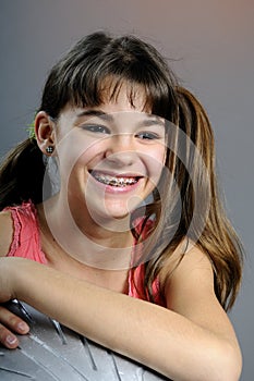 Funny girl smiling with braces
