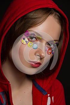 Funny girl with stickers eyes