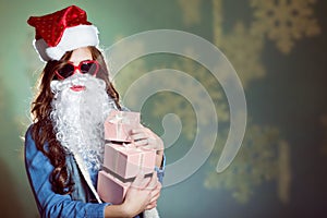 Funny girl wearing xmas santa hat and beard