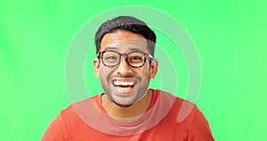 Funny, glasses and an Asian man laughing on a green screen isolated on a studio background. Silly, happy and a face