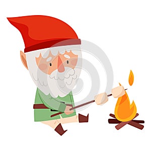 Funny Gnome Character with White Beard and Red Pointed Hat Frying Marshmallow Vector Illustration photo
