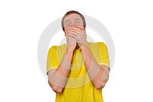 Funny guy loudly laughing out loud covering mouth with hands isolated on white background