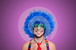 Funny guy naked with blue wig and red tie