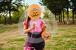 Funny Halloween kid girl carnival costumes with orange balloons