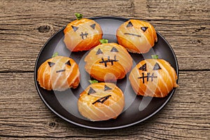 Funny Halloween Sushi Pumpkins Jack o Lantern, Sushi Monsters. Temari sushi, sushi balls. Healthy food for kids