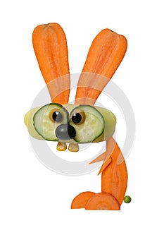 Funny hare made of carrot and pepper on white background