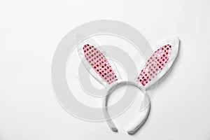 Funny headband with Easter bunny ears on white background