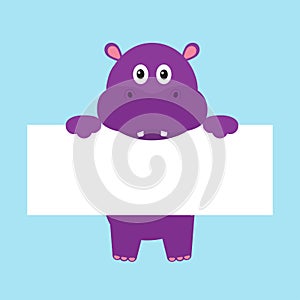 Funny hippo hippopotamus behemoth hanging on paper board template. photo