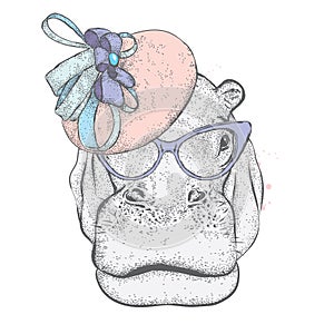 Funny hippo in a lady`s hat and sunglasses. Print on clothes. Lady.