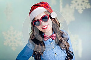 Funny hipster girl in heartshape sunglasses