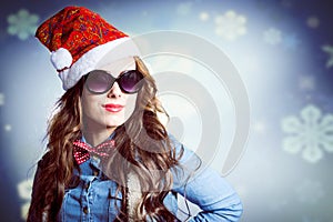 Funny hipster girl in sunglasses wearing xmas