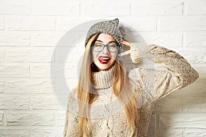 Funny Hipster Girl in Winter Clothes Going Crazy