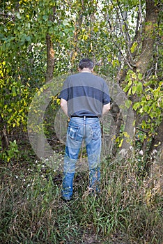 Funny Humor Man Pee in Woods