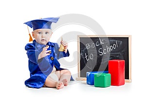 Funny kid with bell in academician clothes at