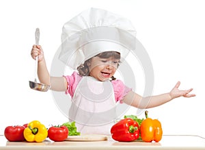 Funny kid scullion preparing healthy food