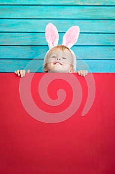 Funny kid wearing Easter bunny