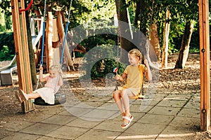 Funny kids playing on playground