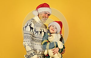 funny knitted sweater. father and daughter celebrate christmas. xmas party together. . winter family holiday. new year