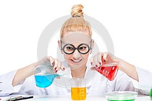 funny laboratory assistant chemist mixes fluids photo