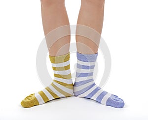 Funny legs in socks of different colors