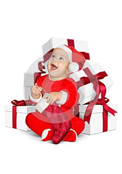 Funny Little baby Santa Claus with Christmas gifts isolated on w