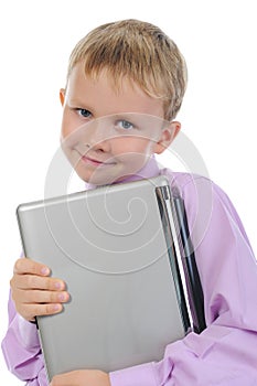 Funny little boy with laptop