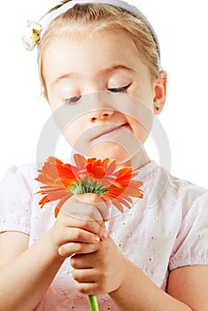 Funny little girl with flower