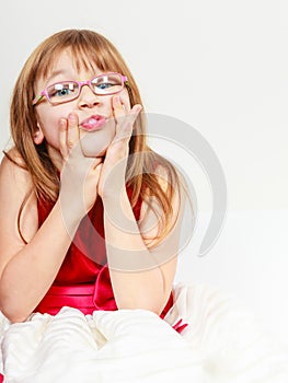 Funny little girl in glasses
