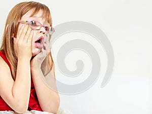 Funny little girl in glasses