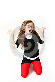 Funny little girl in glasses isolated on white background