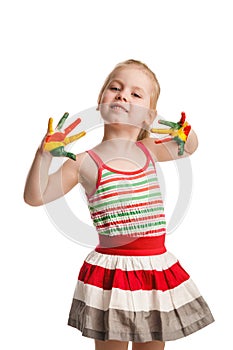 Funny little girl with hands painted in colorful paint. Isolated