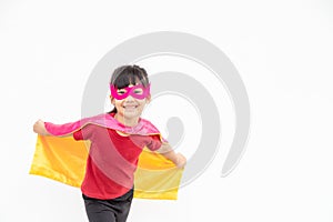 Funny little girl playing power superhero over white background. superhero concept