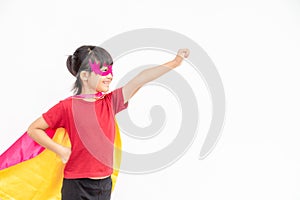 Funny little girl playing power superhero over white background. superhero concept