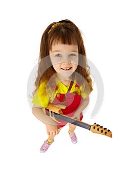 Funny little girl with toy guitar on white