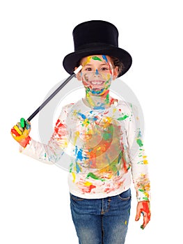 Funny magician with hands and face full of paint