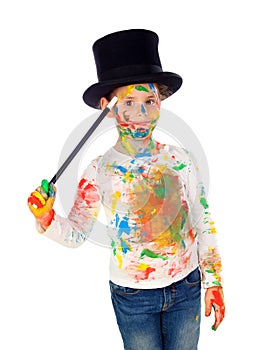 Funny magician with hands and face full of paint