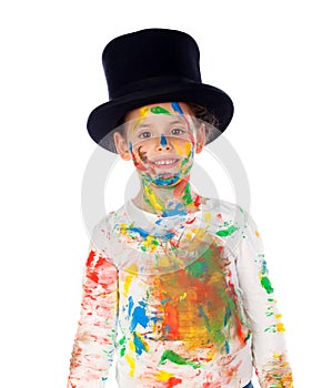 Funny magician with hands and face full of paint