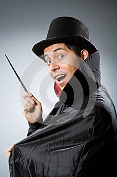 Funny magician man with wand