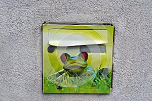 Funny mail box with green frog