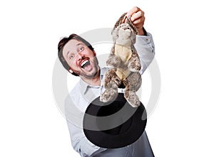 Funny man with big laugh with rabbit from the hat