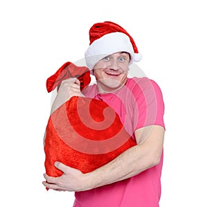 Funny man in cap Santa Claus with red bag of gifts on white background. File contains a path to isolation