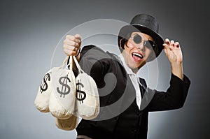 The funny man with dollar sacks