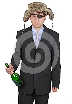 Funny man in fur hat with a bottle