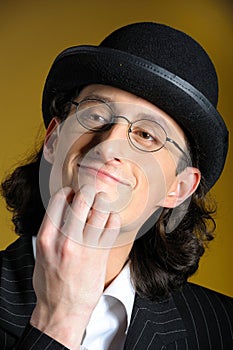 Funny man in glasses in retro suit photo
