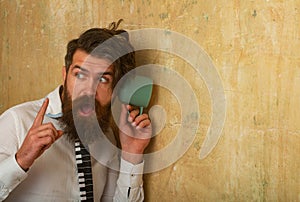 Funny man hear gossip with cup. Excited guy listen at wall. Man listening through the wall with the cup. Secrets and